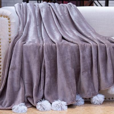 China Solid Velvet Anti-pilling Touch Flannel Silk Fleece Blanket Throws With Chenille Pompoms for sale