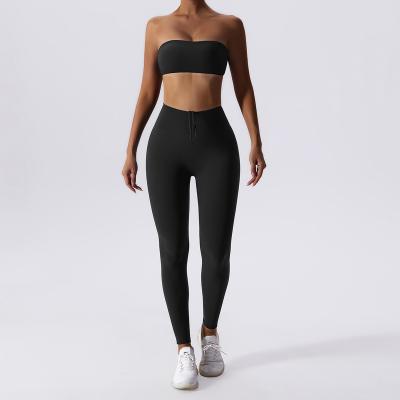 China Nylon ammonia blend Naked Tight Yoga Suit Set Sexy Underlay Sports Bra Gathering Training Fitness Suit for sale