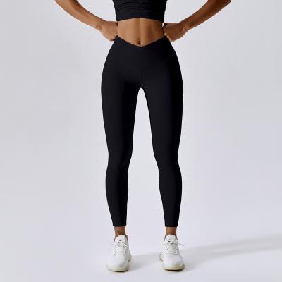 China Nylon ammonia blend Naked High Waist Yoga Pants with Hip Lift Quick Dry Fitness Pants Tight Pilates Sweatpants for sale