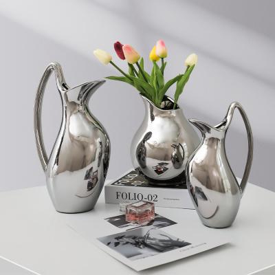 China Nordic modern style nodic minimalist kettle vases porcelain creative ceramic vase for home decoration for sale