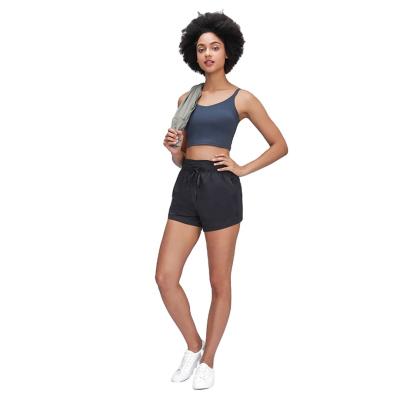 China Breathable 2021 spring and new summer drawstring waist YOGA SHORTS sports women's solid color pocket loose and breathable pants for sale