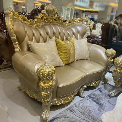 China Classic Armchair Handcrafted Cutout Wood Handcrafted Sofa Gold Leather Sofas Classic Genuine for sale