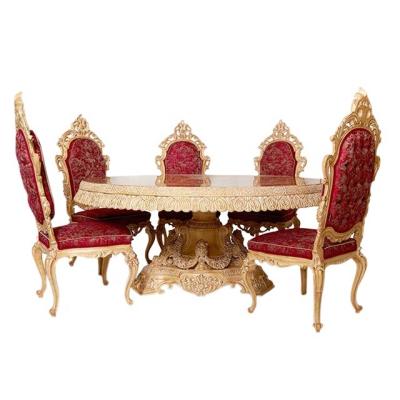 China Dubai Style Luxury Wood Round Handcrafted Carved Wooden Dining Table Set SHE Home Palace Elegant Dining Room Furniture for sale