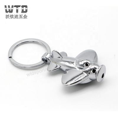 China Factory Design Free Iron WTD Shape Logo Soft Enamel Souvenir Metal Key Chain for sale