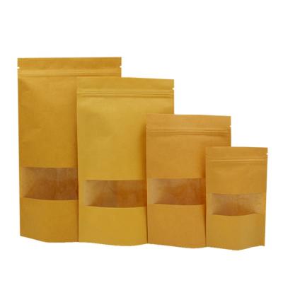 China Recycled Materials Wholesale Biodegradable Resealable Zip Lock Brown Kraft Paper Bags With Clear Window And Zipper For Food Packaging à venda