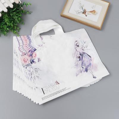 China Household Products Compostable Portable PLA Plastic Bag For Clothes Cornstarch T-shirt Biodegradable Handle Bags Garment Packaging for sale