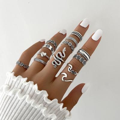 China Unisex Europe and the United States best-selling accessories personality exaggerated serpentine flowers like geometric ring joint ring for sale