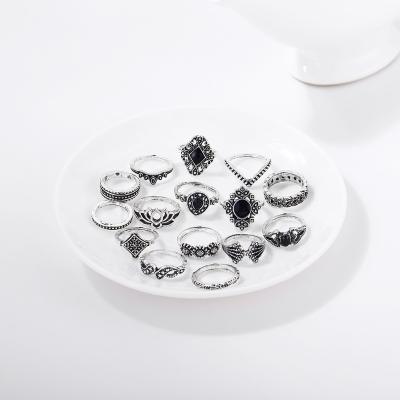 China Hot Selling Vintage 15-Piece Vintage Ring Sets Hollow Lotus Set Ring Black Stone Finger Ring Jewelry for sale