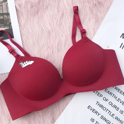 China High quality one piece 6 color small breast padded no wire lift up bra wireless insert bralette with heart print for sale