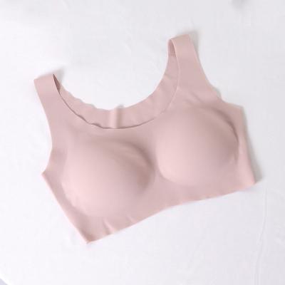 China Newspaper one size bra radio sleep pullover bonded bra QUICK DRY women yoga soft comfortable wireless invisible sports bra for sale