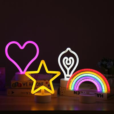 China Portable Plastic Projector Night Light Star Night Light Decorative Table Party Star Neon Lamp For Kids Room for sale