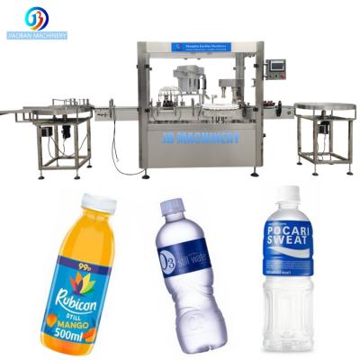 China JB-YG4 APPAREL hot selling 4/8/12 heads juice filling machine mineral water milk bottling machine Shanghai liquid machine for sale