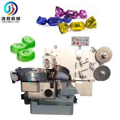 China JB-600S Automatic Beverage Double Twist Caramel Candy Wrapping Machine for sale