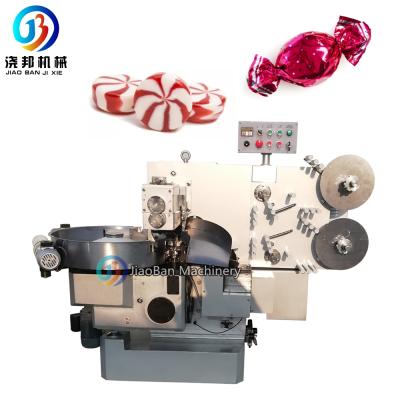 China Small Fruit Twist Double Food JB-600S Sweet Hard Milk Candy Wrapping Machine for sale