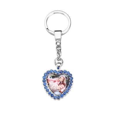 China Metal and Crystal-decorated Glass Sublimation Mute Key Chain for Souvenirs and Gifts for sale