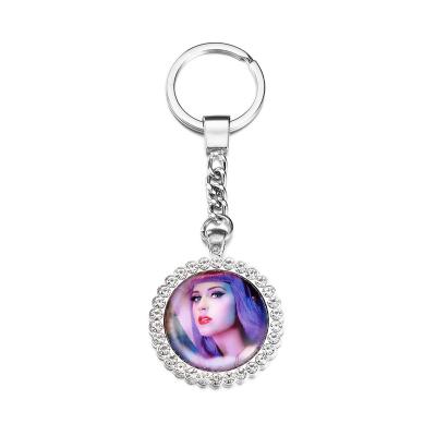 China Metal round shape and fashion style crystal-decorated sublimation mute keychain for souvenirs and gifts for sale