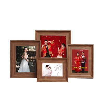 China Custom Folk Art High Quality Picture Photo Frame Wood Shade Box Picture Frames Wholesale in China for sale