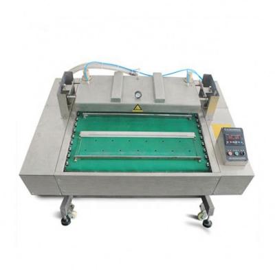 China Food Continuous High Speed ​​For Rolling Belt Type Vacuum Chicken DZ Packing Machine for sale