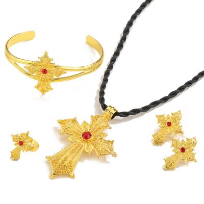 China Fashion Ethnic Design Diamond Necklace Bracelet Earring Ring Red Four Piece Gold Plated Cross Set Women for sale