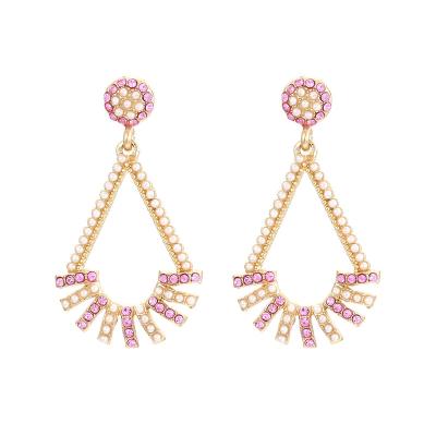 China TRENDY New Fashion Simple Drop Shaped Female Creative Niche Pearl Stud Earrings Colored Diamond Earrings for sale