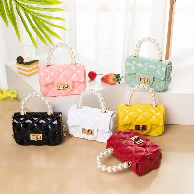 China Wholesale Cheap Fashion Candy Color Little Girl Handbag PVC Pearl Cross Mini Body Pearl Coin Purse Kids Jelly Handbag Small Purse for sale