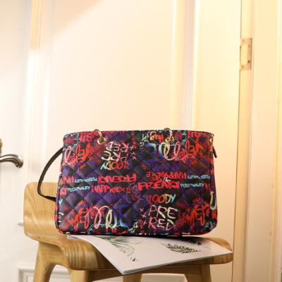 China Fashion factory color perfume jelly graffiti shoulder messenger bag small bag chain rhombus graffiti bag wholesale trend large bag for sale