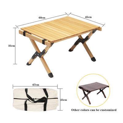 China Easy To Carry Modern Design Garden Solid Wood Foldable Tables Outdoor Egg Roll Easy Carry Raise Camping Folding Tables for sale