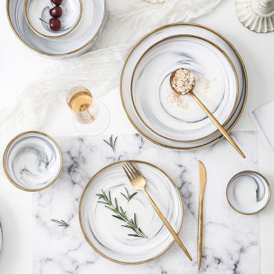 China Sustainable Luxury Ceramic Gold Rim Porcelain Gray Marble Dinnerware Set From Europe for sale