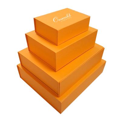 China Recycled Materials Magnet Folding Custom Rigid Packing Box With Magnetic Lid Luxury Orange Color Paper Flat Foldable Gift Box For Clothing for sale