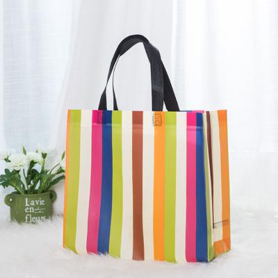 China Reusable nonwoven tote bag nonwoven bag with printed logos laminated nonwoven fabric folding shopping bag reusable logo printed for sale