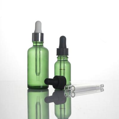 China Empty round green flint flint personal care essential oil personal care gel dropper glass bottle 30ml 50ml 100ml DIN 18mm for sale