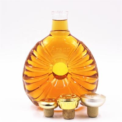 China Hot sale 750ml star shell shape whiskey vodka spirit glass shinning beverage bottle for sale