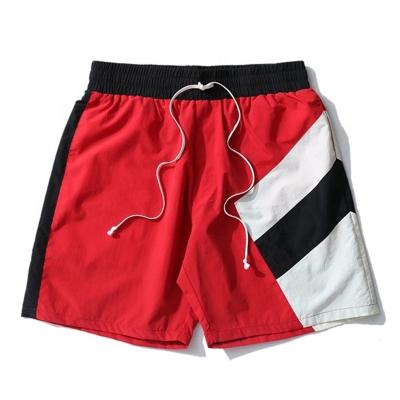 China New Stylish Trending Anti-wrinkle Men's Running Shorts Summer Track Shorts Custom Color Block Shorts for sale