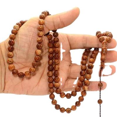 China Other 2022 New Design Hot Selling And Cheap Price Popular Good Quality Islamic Muslim Kuka Wooden Tasbeeh Prayer Beads 99pcs for sale