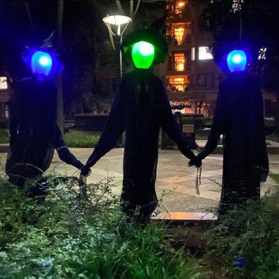 China Factory Price Halloween Scary Voice-Activated Decoration Induction Luminescent Sound 3 People Holding Hands Witch Props for sale