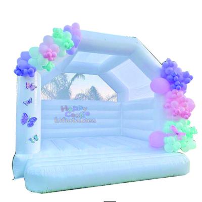 China Indoor and outdoor entertainment the hot sale commercial wedding white bouncy castle inflatable jumper with roof for sale for sale