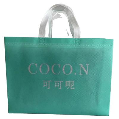 China Ultrasonic Handled Removed 80GSM 1Color 1Side Pink Letter Printing Nonwoven Wrapping Bags Custom Wrapping Handles X Repair for sale