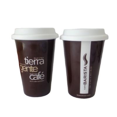 China Viable Hot Selling Travel Coffee Mug V Shape Ceramic Mug With Silicone Lid for sale