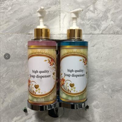 China Hot Selling Double Soap Dispenser Hotel 350ml Wall Mounted Hand Soap Lotion Dispenser with Stainless Steel Holder and Refillable Bottle for sale