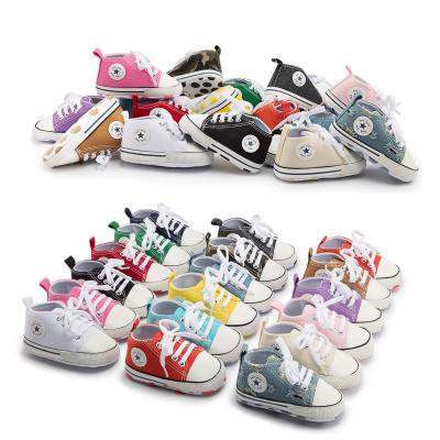 China Designer Wholesale 20 Colors ODM/OEM Anti-Slippery Canvas Shoes First Walker Boy and Girl Crib Baby Shoes for sale