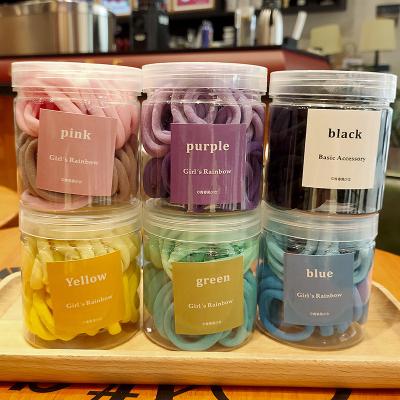 China Fashion 50 Pcs Box Girl Hair Soft Elastic Band High Stretch Headband Candy Colored Rubber Band Towel Ring for sale