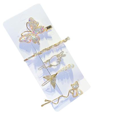 China Japanese Korean Cute Insist Fairy Alloy Hair Clips Pearl Butterfly Rhinestone Super Lady Pearl Scissors Feather Hair Clips for sale