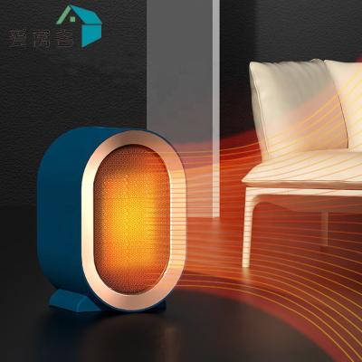 China Hot Selling Fashional Mini Fan Heater Electric Desktop Household PTC Portable Fan Heater Plug-in Device for sale