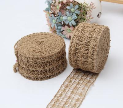 China 6.5cm Hollowed Out Cobweb Rolls Christmas Party Decorations Natural Burlap Ribbon With Lace Burlap Ribbon for sale