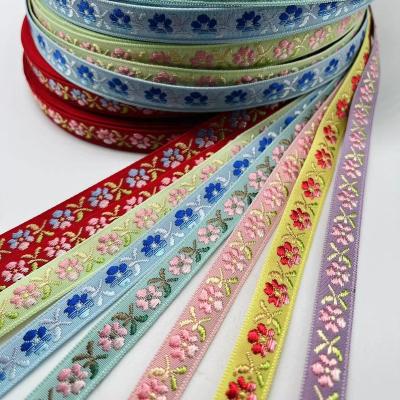 China Hand-low MOQ high tenacity flower embroidery nylon jacquard webbing for sale