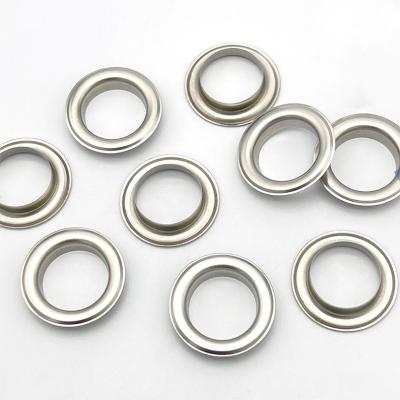 China Other cheap custom logo round metal stainless steel grommet shoe garment supplies eyelets button for clothing and bag for sale