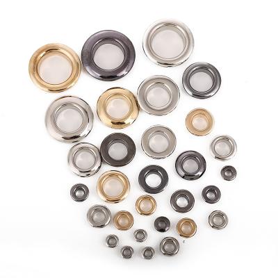 China Other wholesale cheap custom logo round metal stainless steel grommet shoe garment supplies eyelets button for clothing and bag for sale