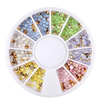 China Plastic Colors Mixed Shape Rhinestones Flat Back Mixed Nail Art Accessory In 1 Wheel Box for sale