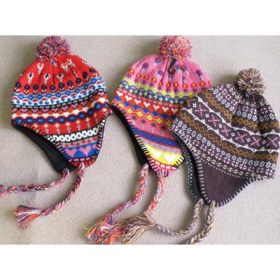 China COMMON fashion design winter knitted hat printed kids knitting earflap cropped hat with earflap and braids for sale