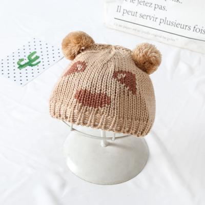 China Cheap common stock winter hat baby pom posellingm hat knit beanie for kids factory direct sale for sale